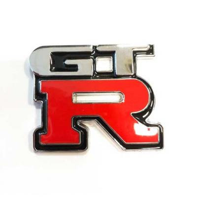 Emblma "GT R" , krm-piros